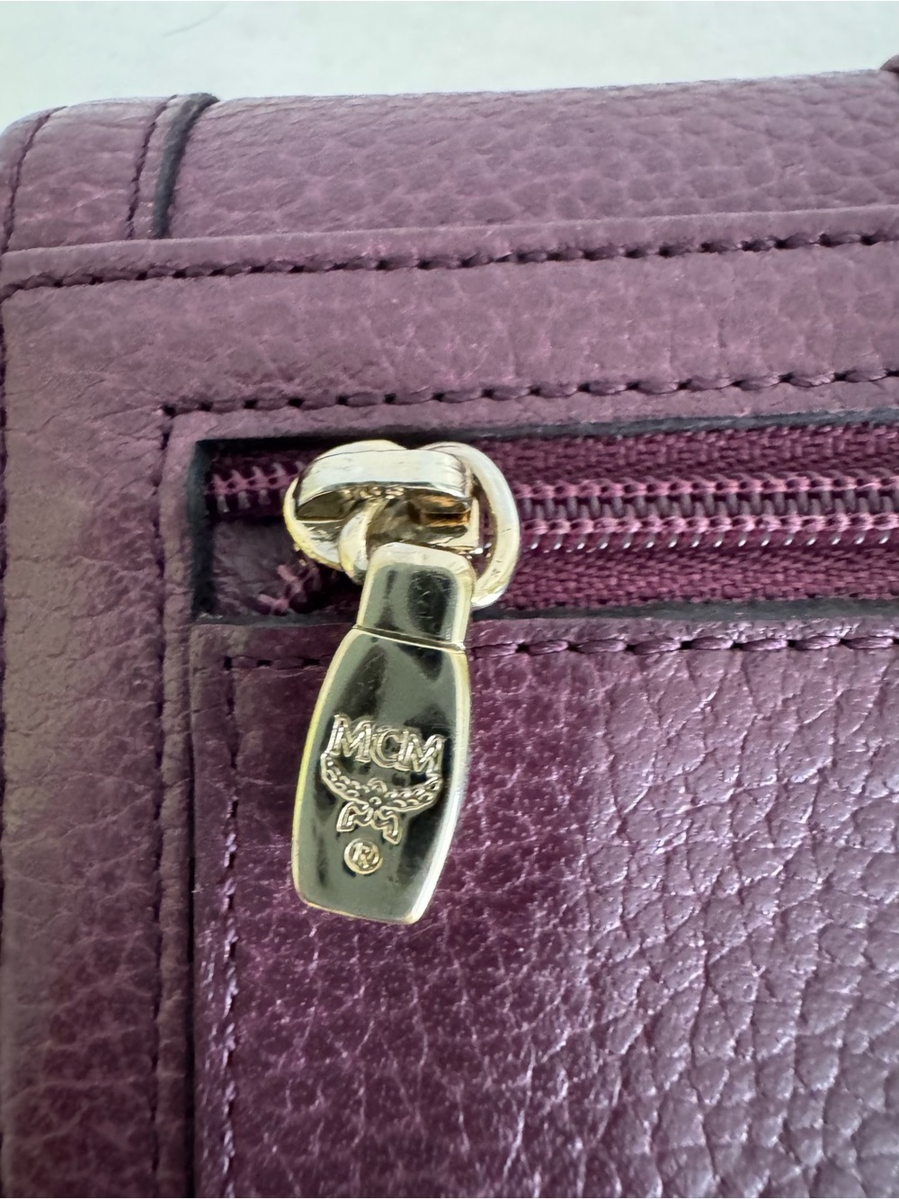 MCM Plum Textured Leather Continental Wallet with Gold Accents - Picture 4 of 11
